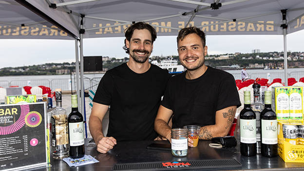 Two young men volunteers smiling for the photo